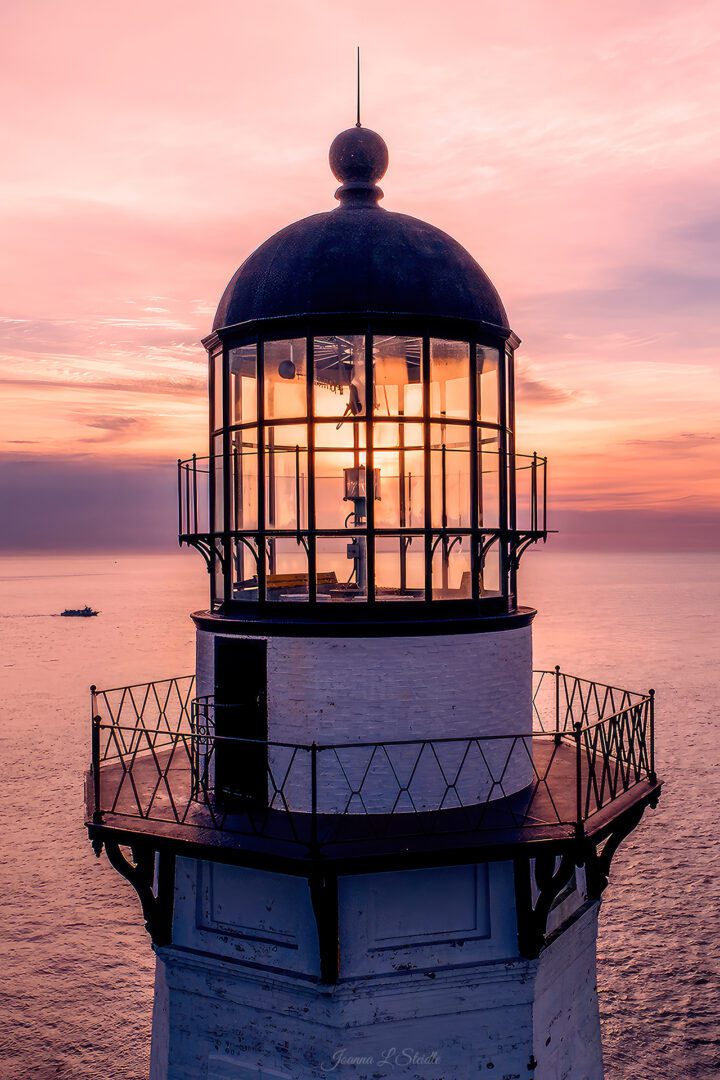 A lighthouse during sunset