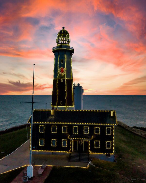 A lighthouse with lights on top of it